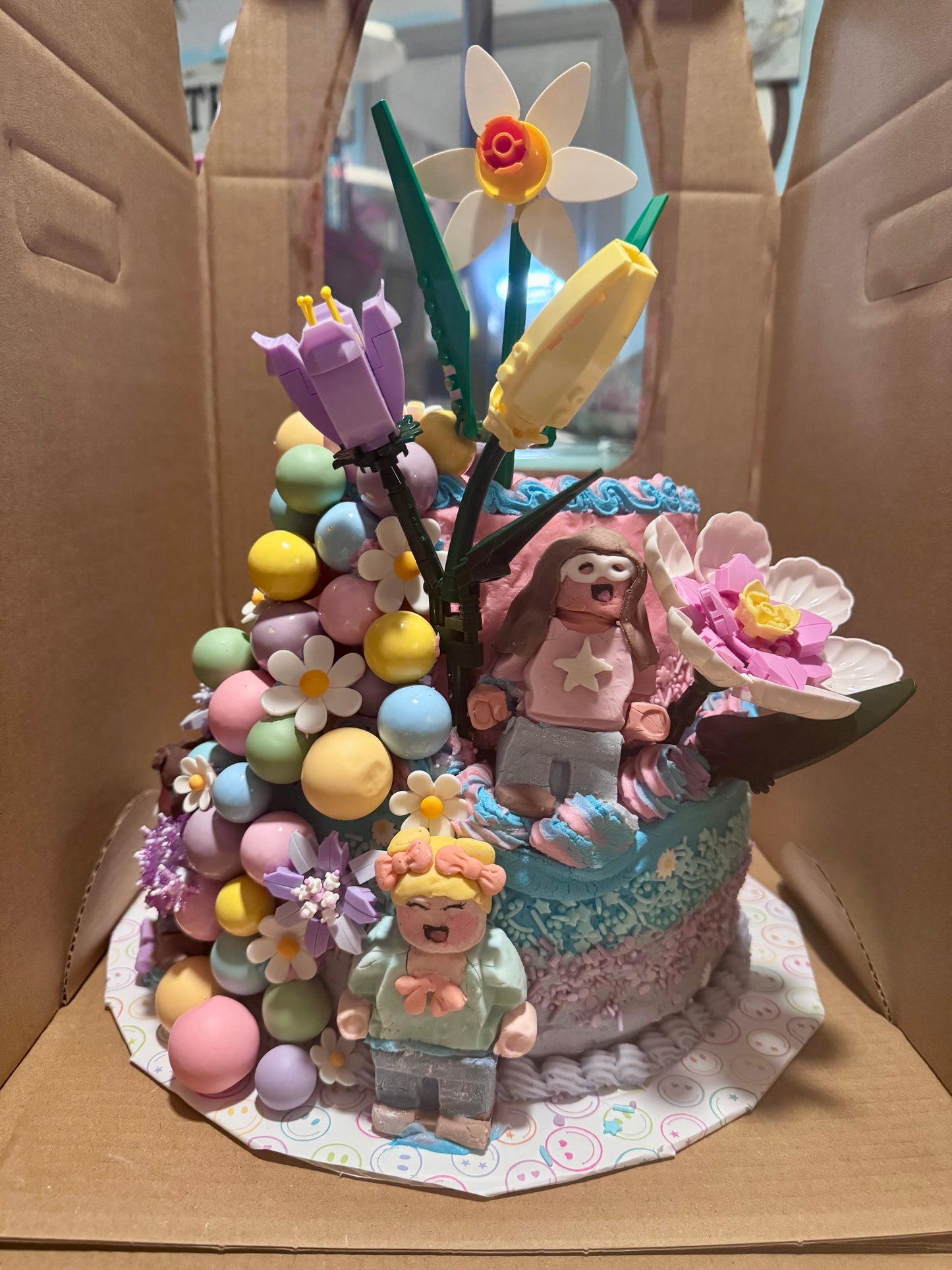Themed TWO- Tiered Buttercream Cake with Fondant/Modeling Chocolate Components